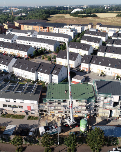 Contracting im Quartier: Luftaufnahme von mehreren Wohnkomplexen.